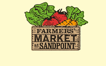 An illustration of a box that reads Farmers' Market at Sandpoint filled with lettuce, tomatoes and carrots.